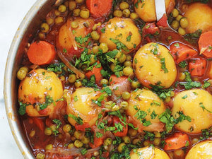 Légumes mijotés en sauce tomate (petits pois,carottes, pommes de terre